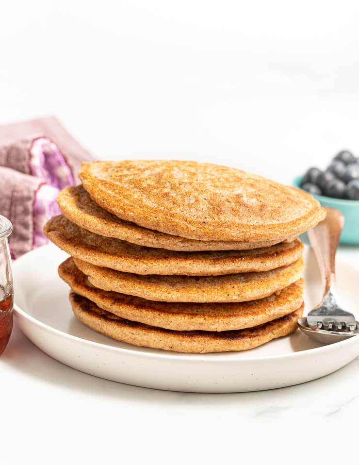 a stack of vegan pancakes with no toppings