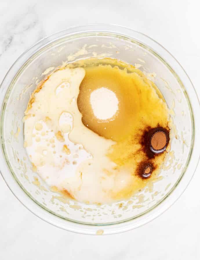 unmixed wet ingredients for banana cake in a bowl