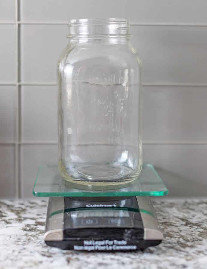 an empty jar on a scale