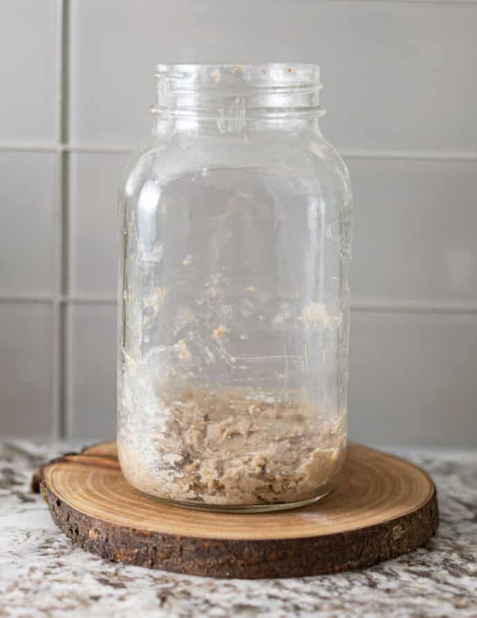rye flour and water mixed together in a jar