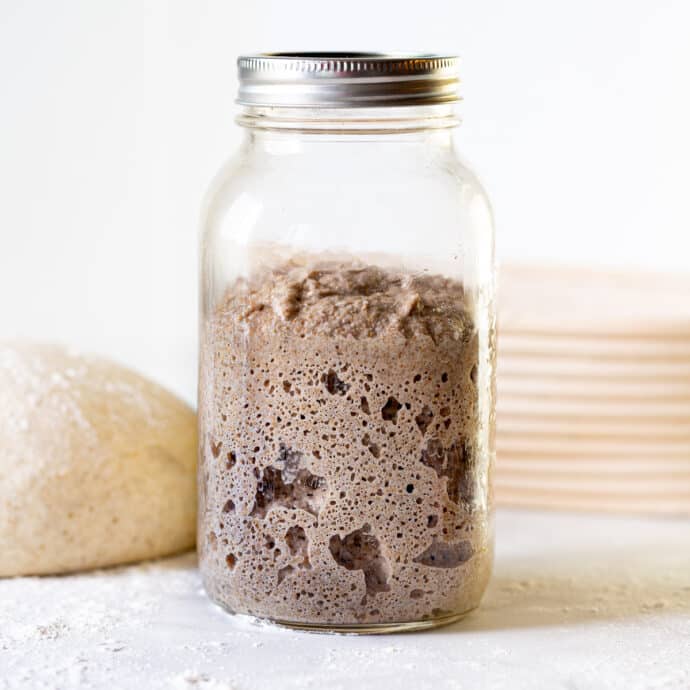 a jar of bubbly sourdough starter