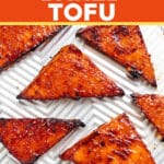 triangles of baked tofu on a baking tray