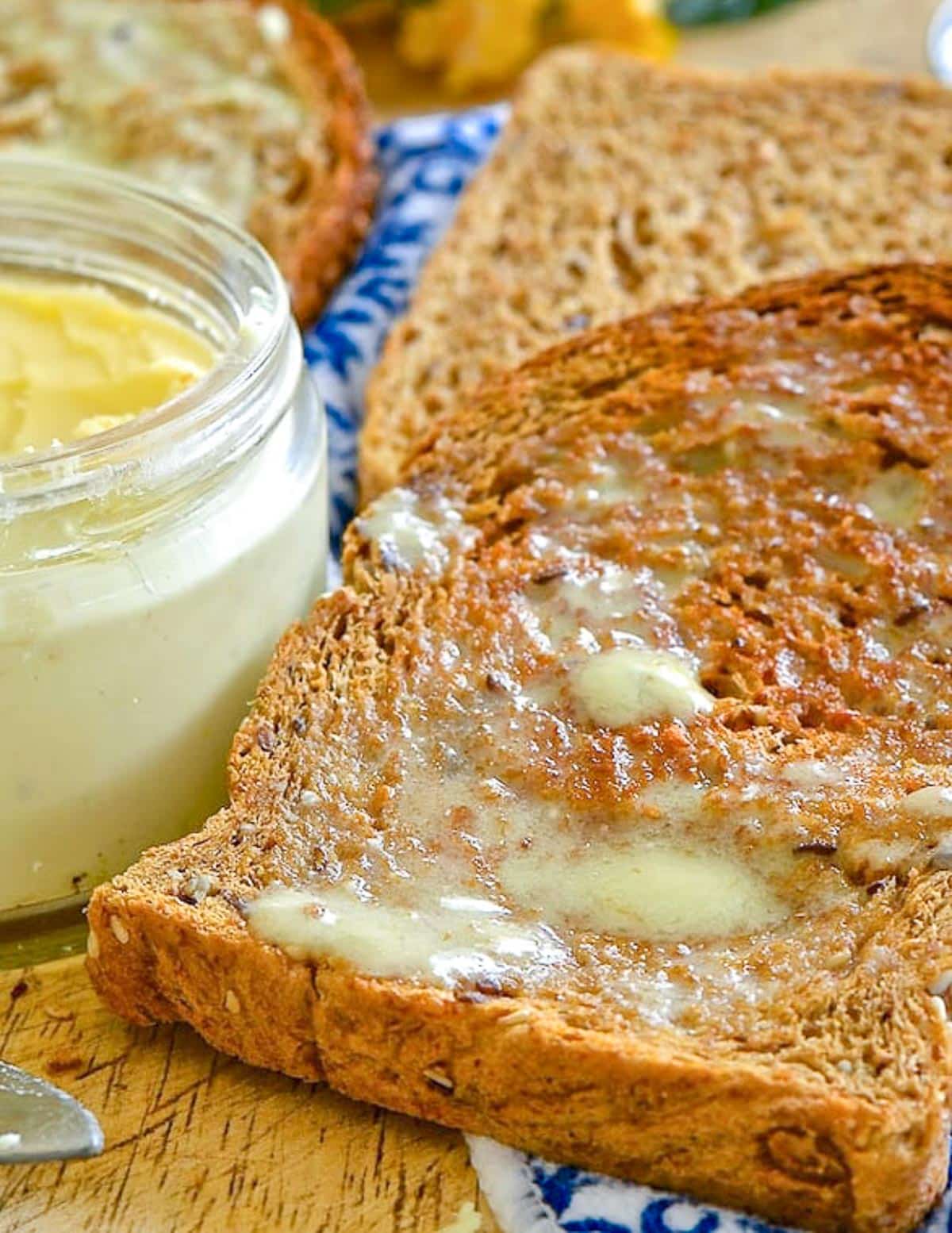 s slice of toast spread with melting butter