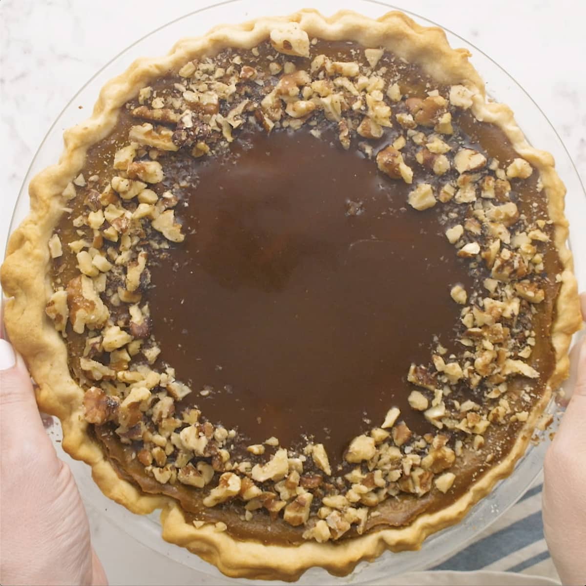 a decorated pumpkin pie