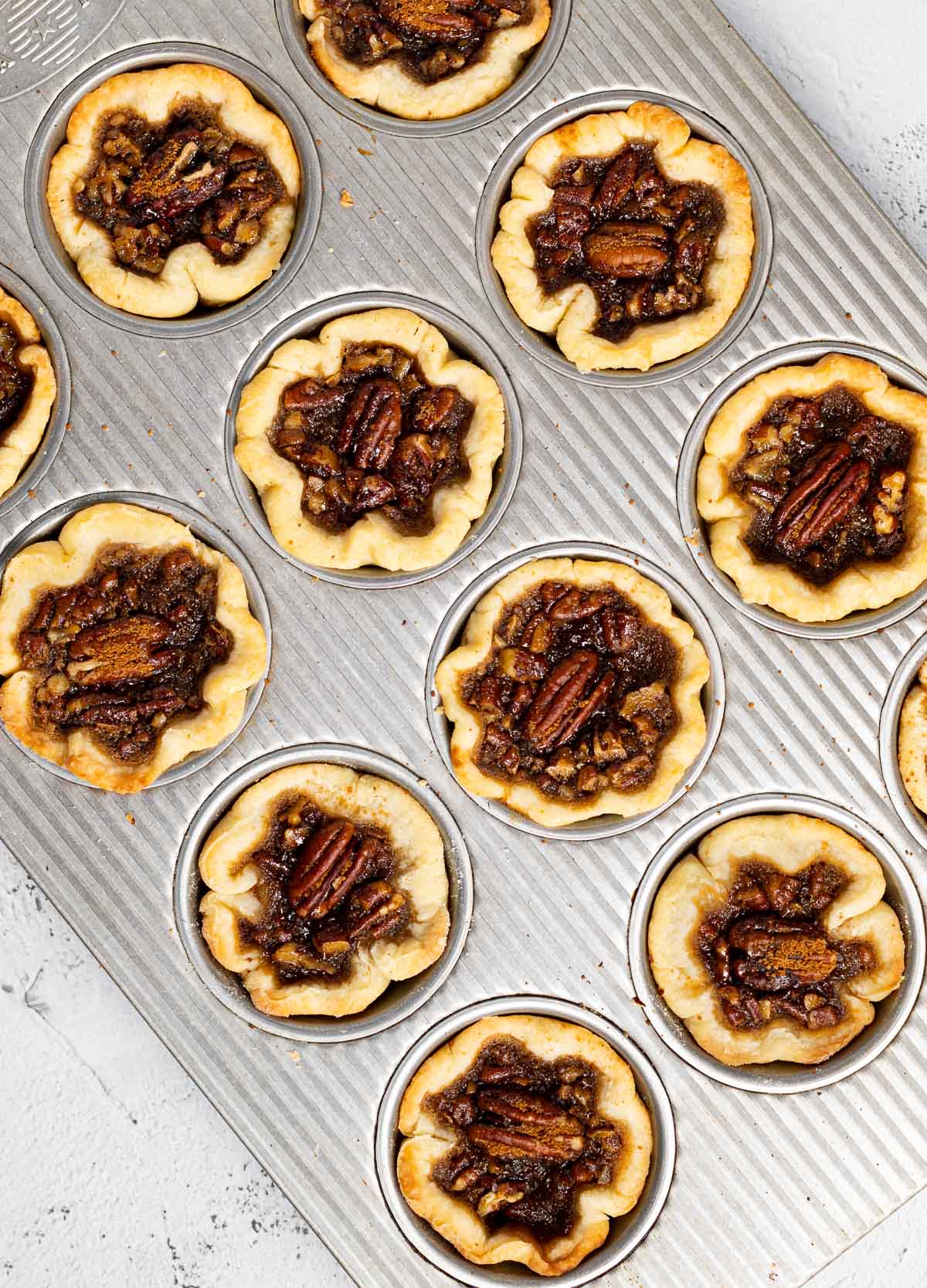 vegan butter tarts in a muffin pan