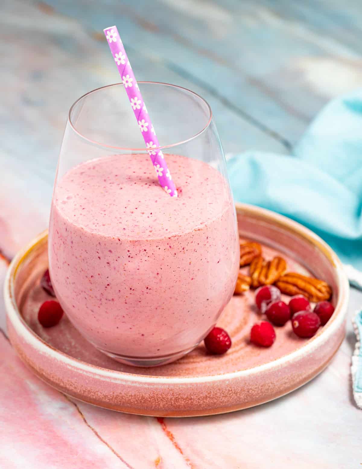a pink smoothie on a pink plate