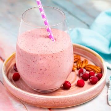 a pink smoothie on a plate