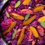 baked red cabbage with apples and vegan sausages