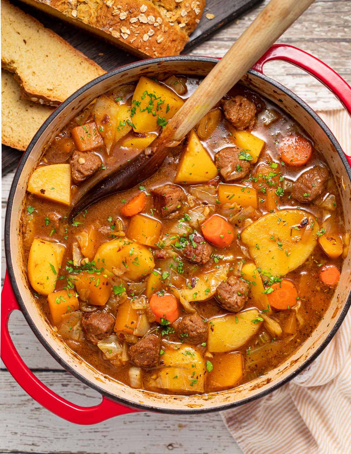 a pan of vegan Irish stew garnished with parsley