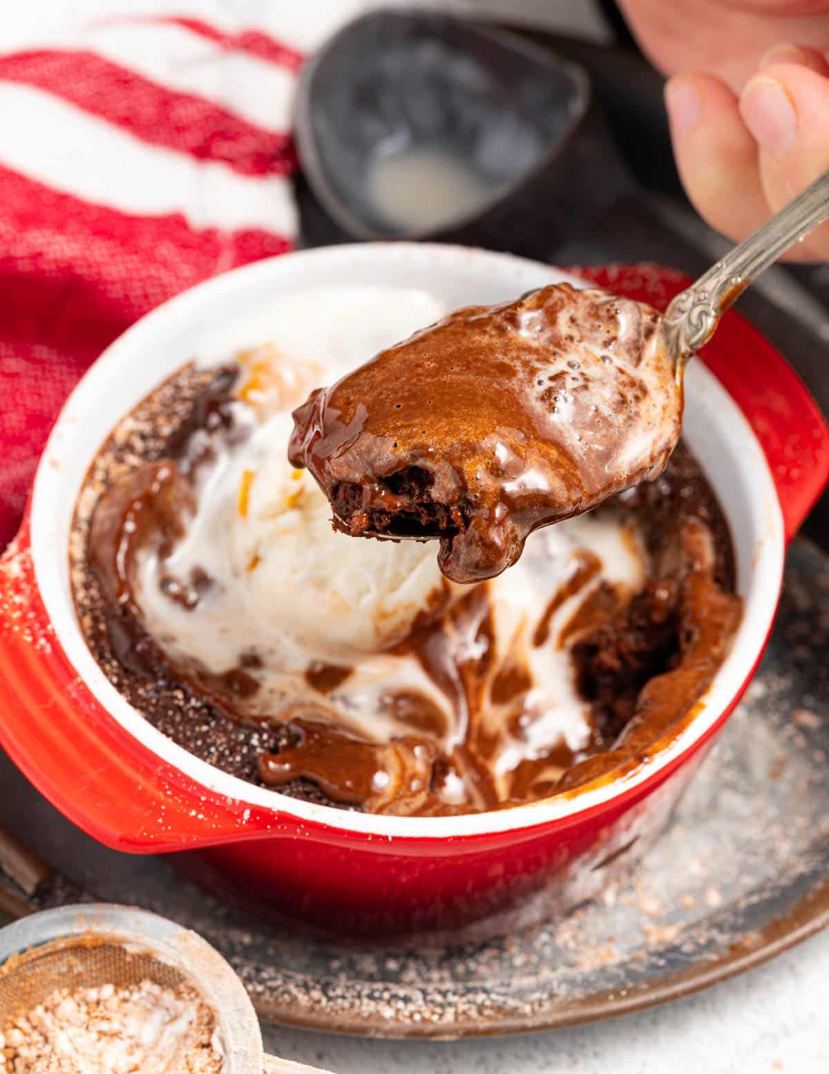 a spoon of lava cake on a spoon