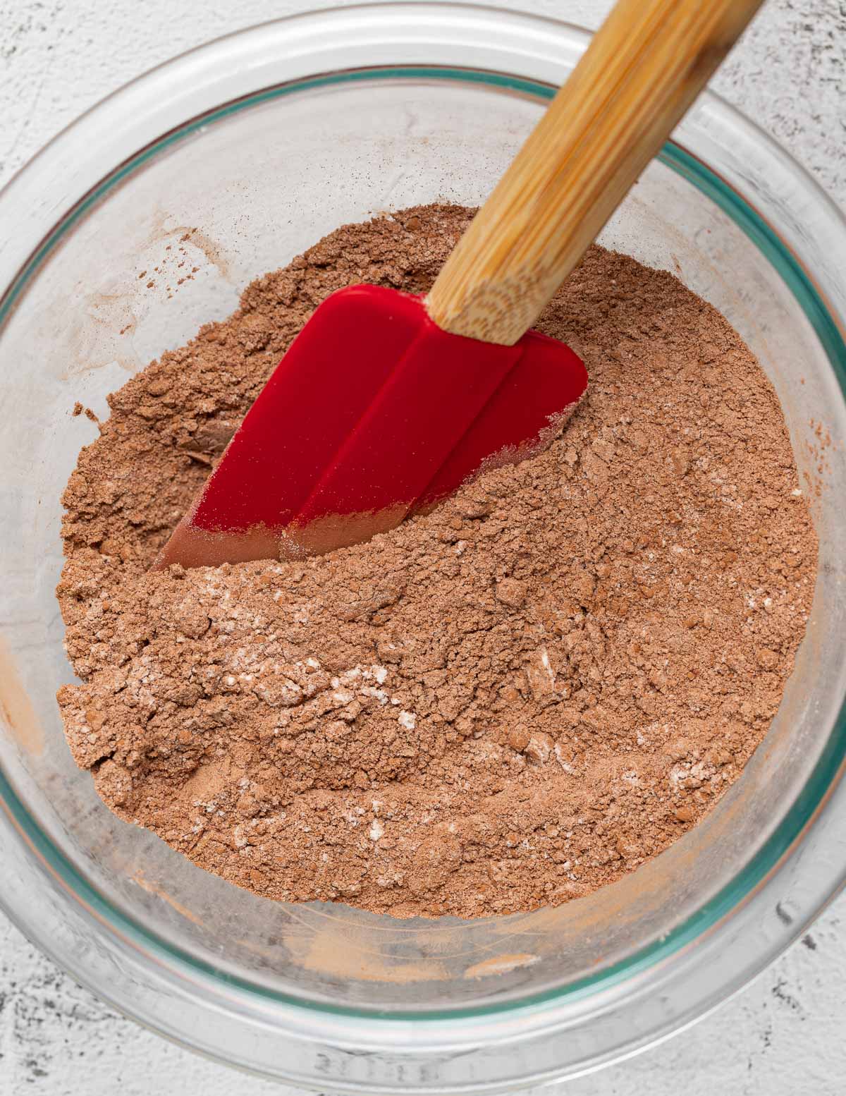 dry chocolate cake ingredients in a bowl