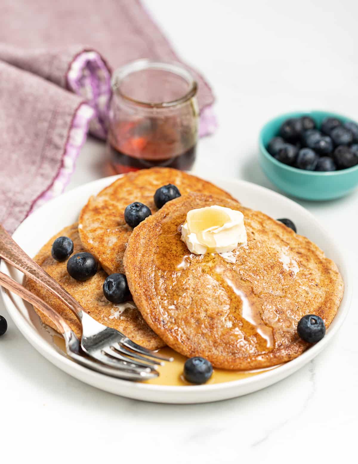 a bowl of pancakes with blueberries