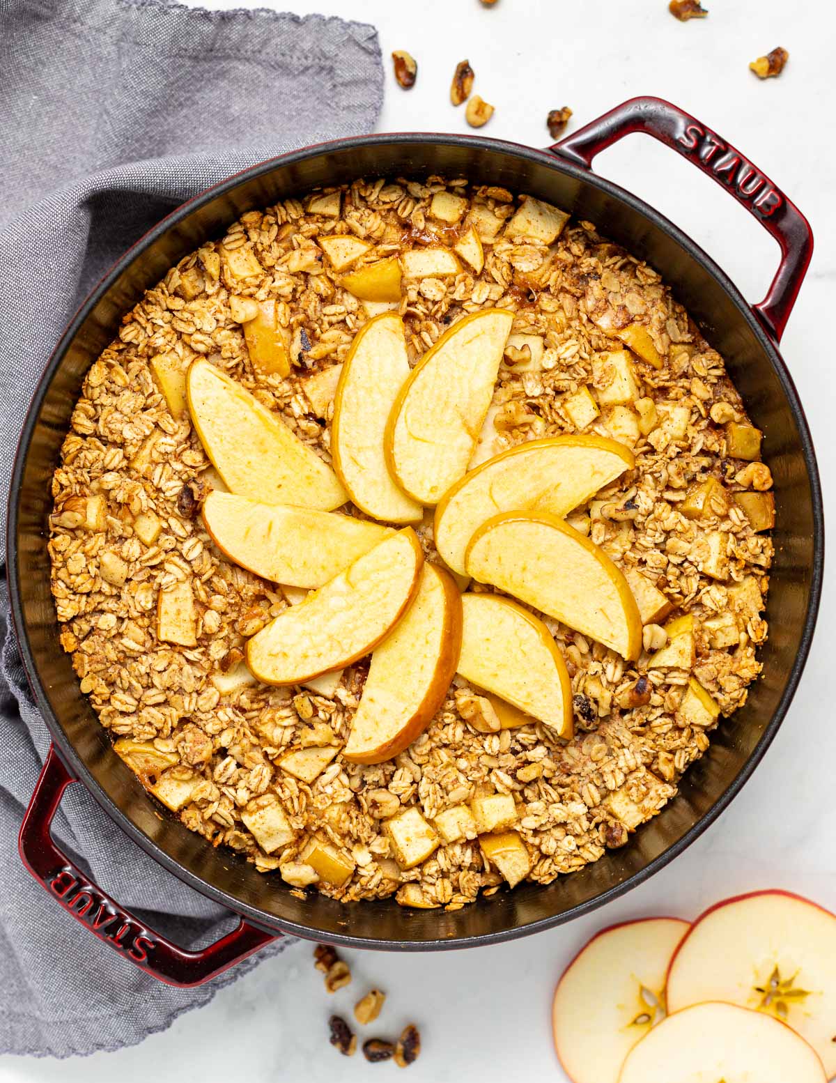 a Staub braiser with apple baked oatmeal in it 