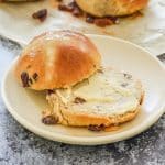 a sliced hot cross bun