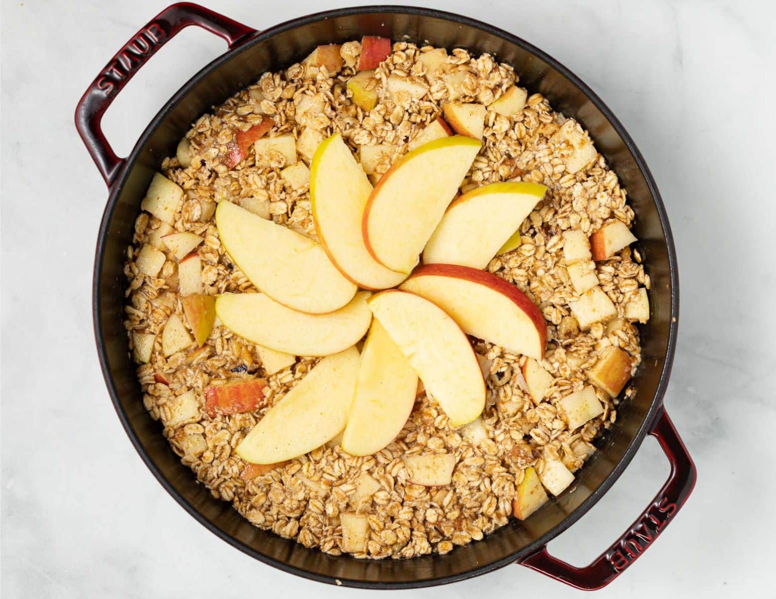 uncooked apple baked oatmeal in a baking deish