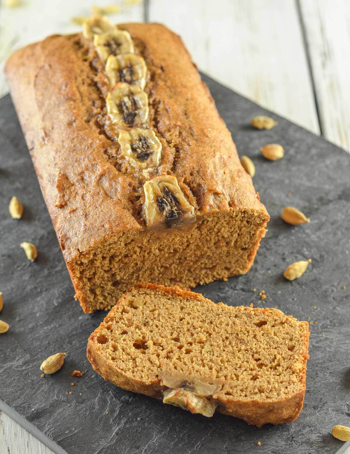 a loaf of banana bread with a slice cut