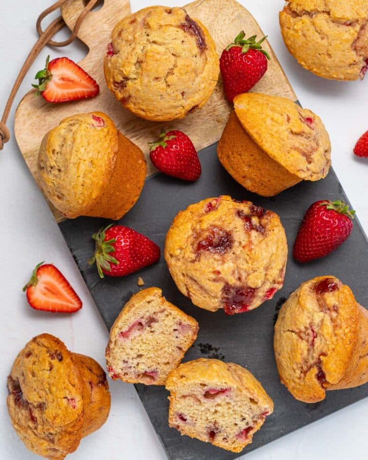 vegan strawberry muffins on a cutting board
