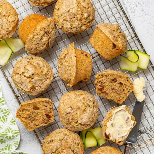 zucchini muffins on a wire rack