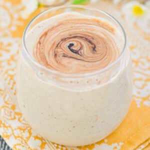 a banana smoothie in a glass