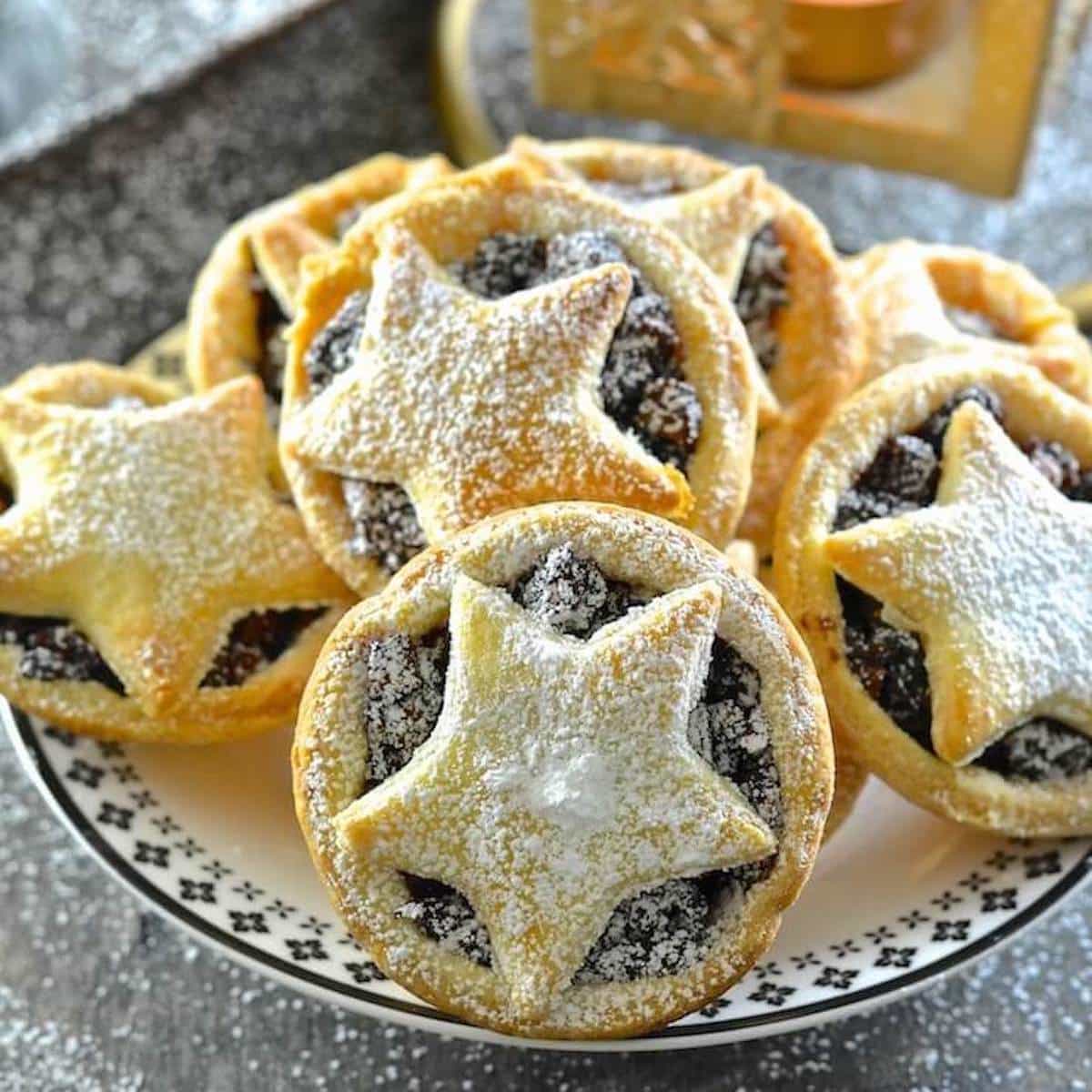 vegan mince pies piled on a plate