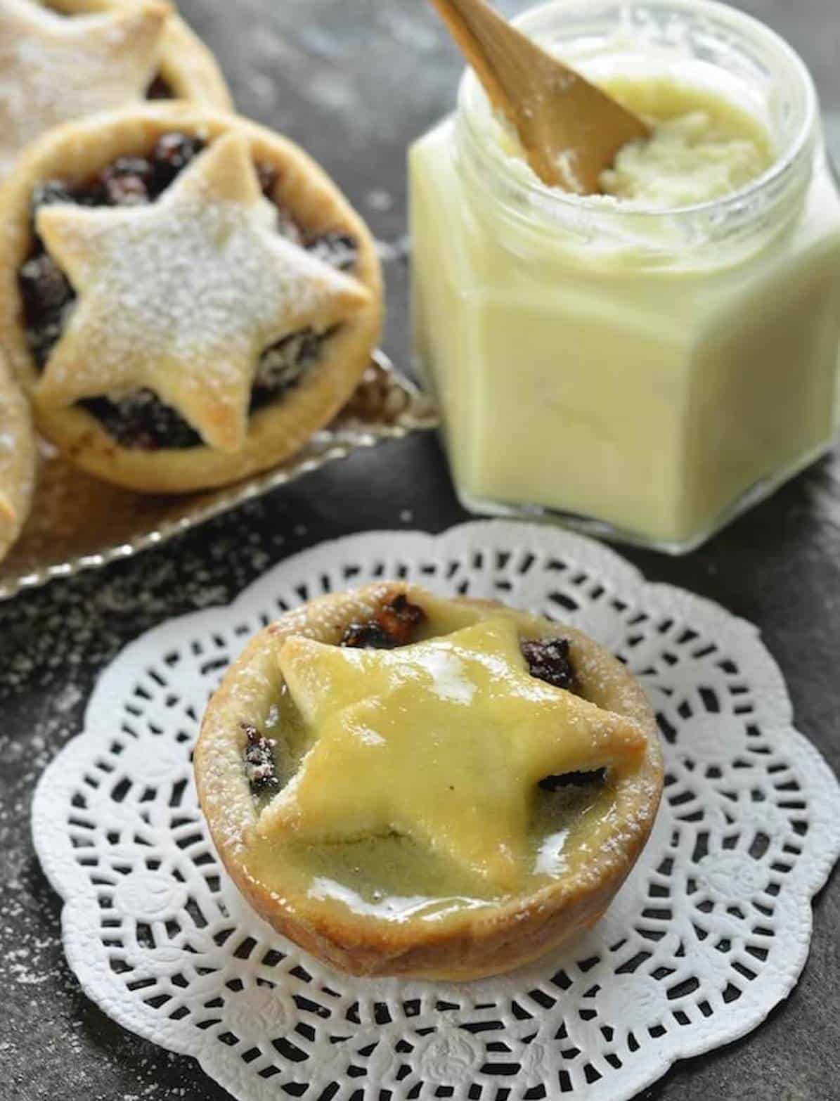 a vegan mince pie with melting brandy butter