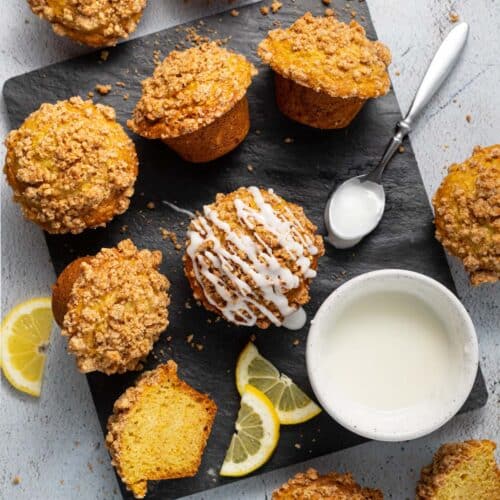 vegan lemon muffins on a slate cutting board