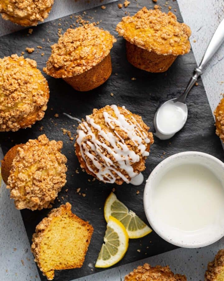 vegan lemon muffins on a slate cutting board