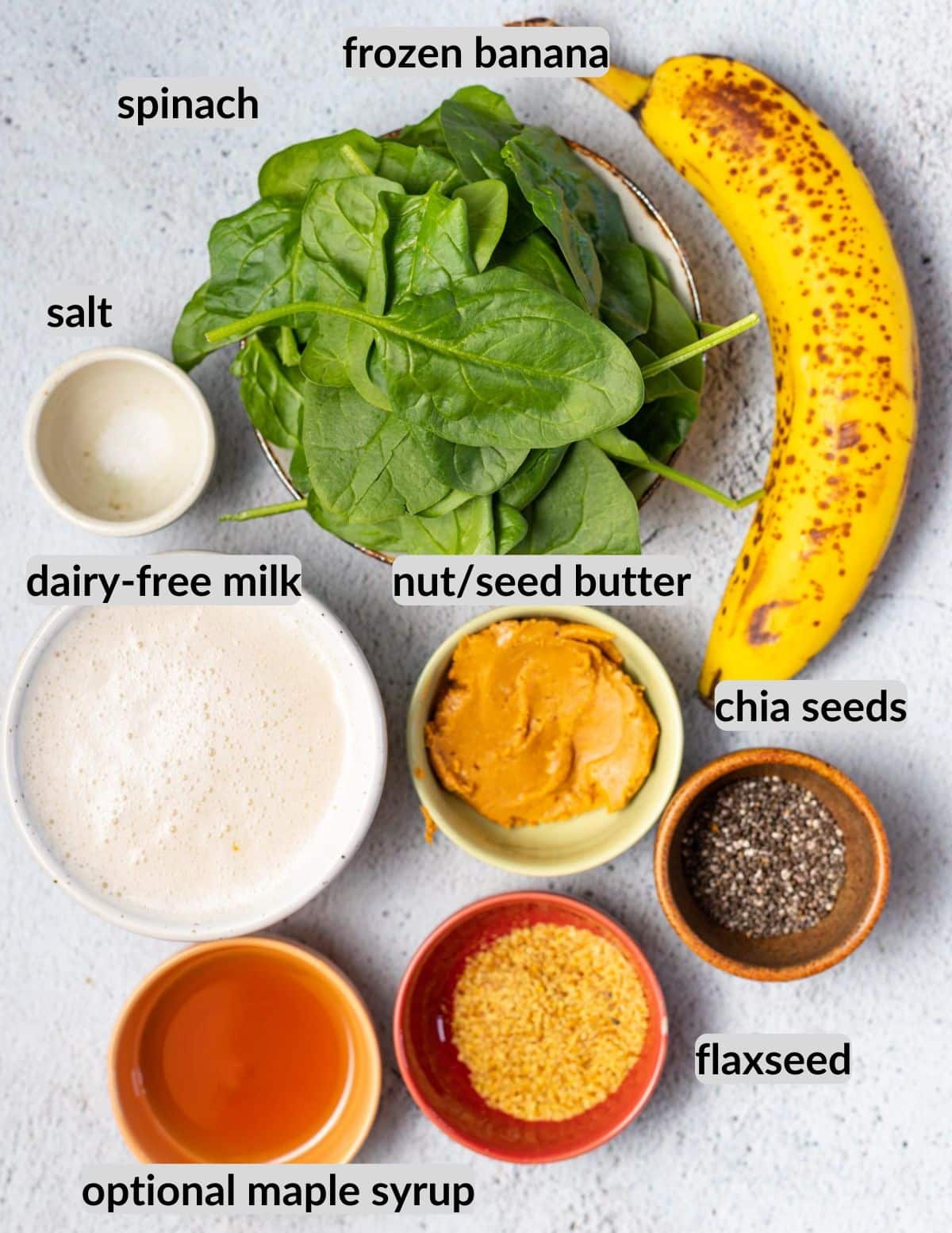 banana, spinach, salt, dairy-free milk, nut/seed butter, chia seeds, flaxseeds, maple syrup