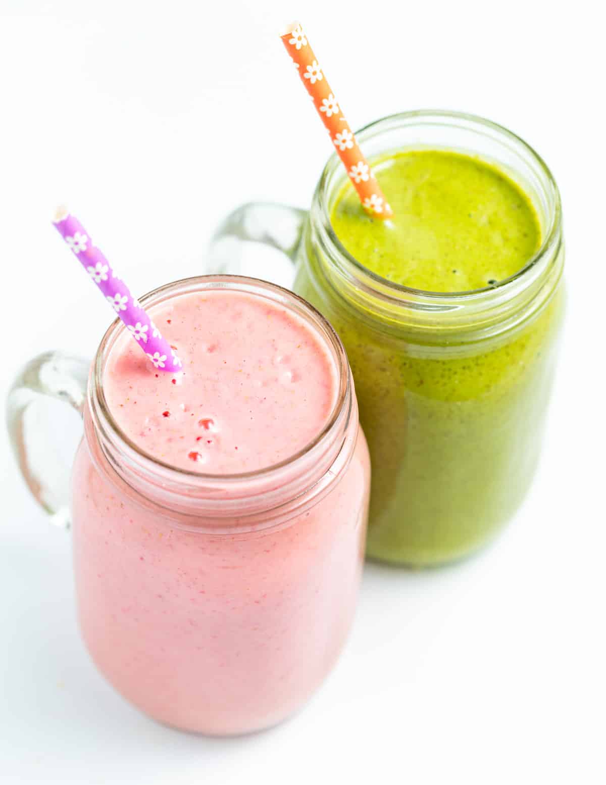 2 vegan smoothies. One pink, one green. 
