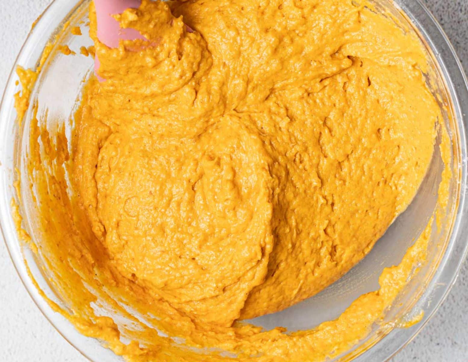 pumpkin muffin batter in a bowl