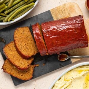 a glazed meatloaf with 4 slices cut