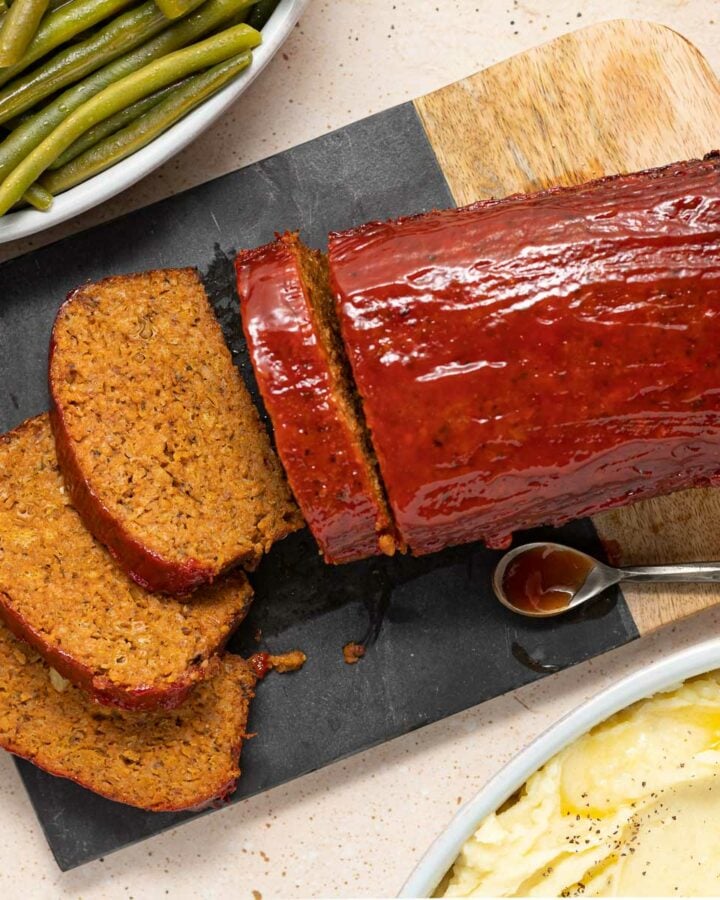 a glazed meatloaf with 4 slices cut
