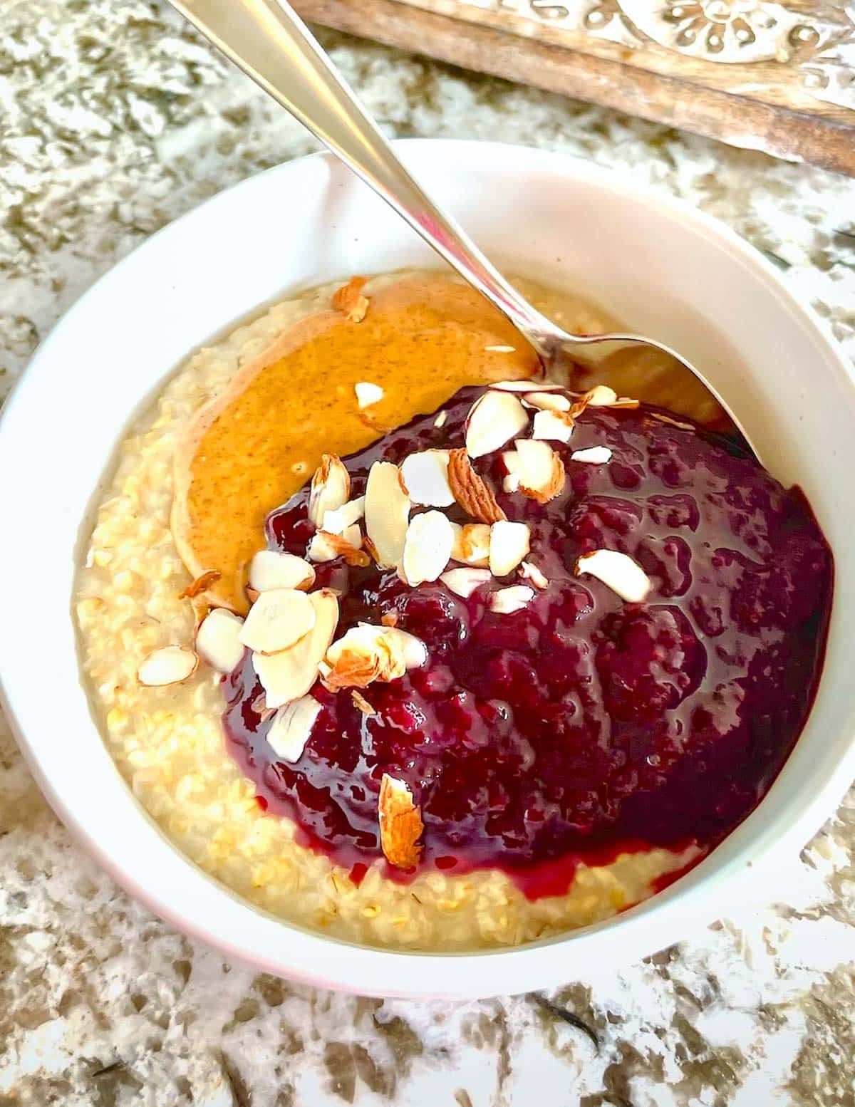 oatmeal with compote and almond butter