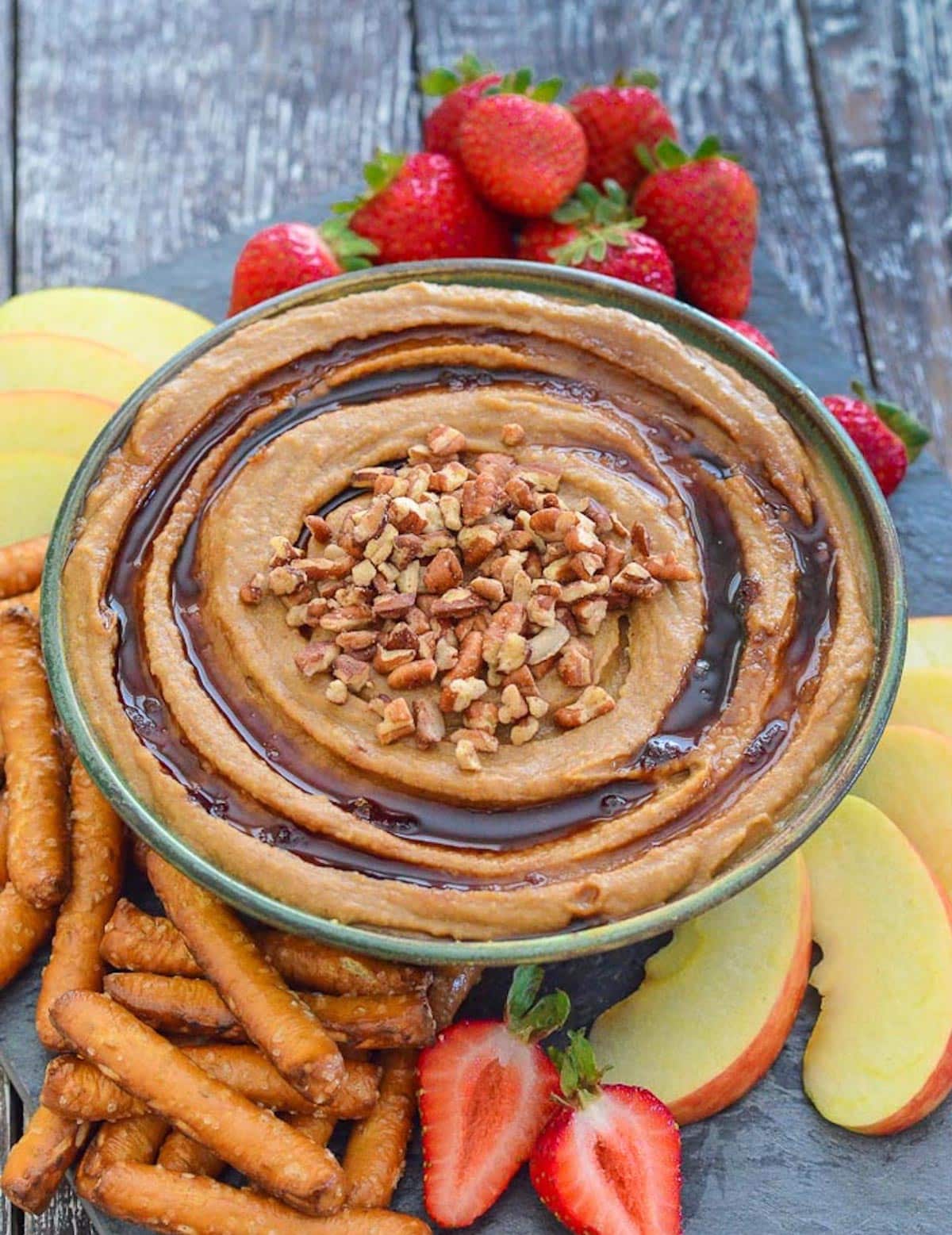 a bowl of snickerdoodle hummus