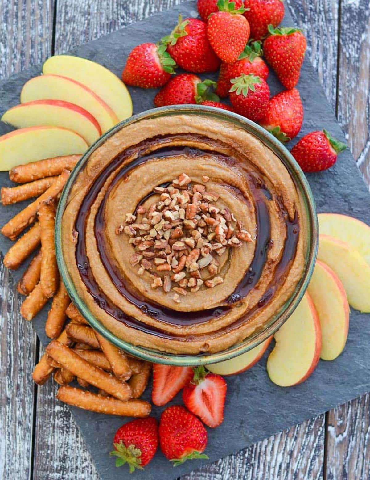 a bowl of snickerdoodle hummus