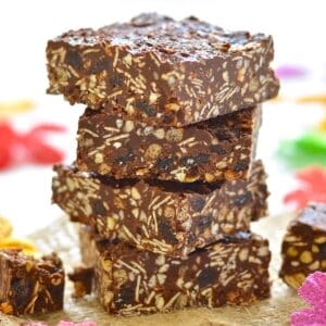 a stack of chocolate tahini crunch bars