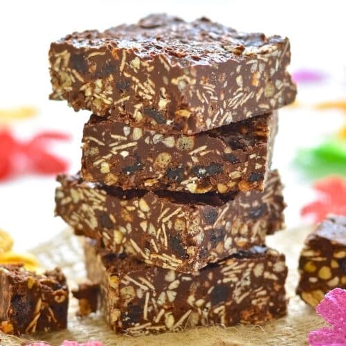 a stack of chocolate tahini crunch bars