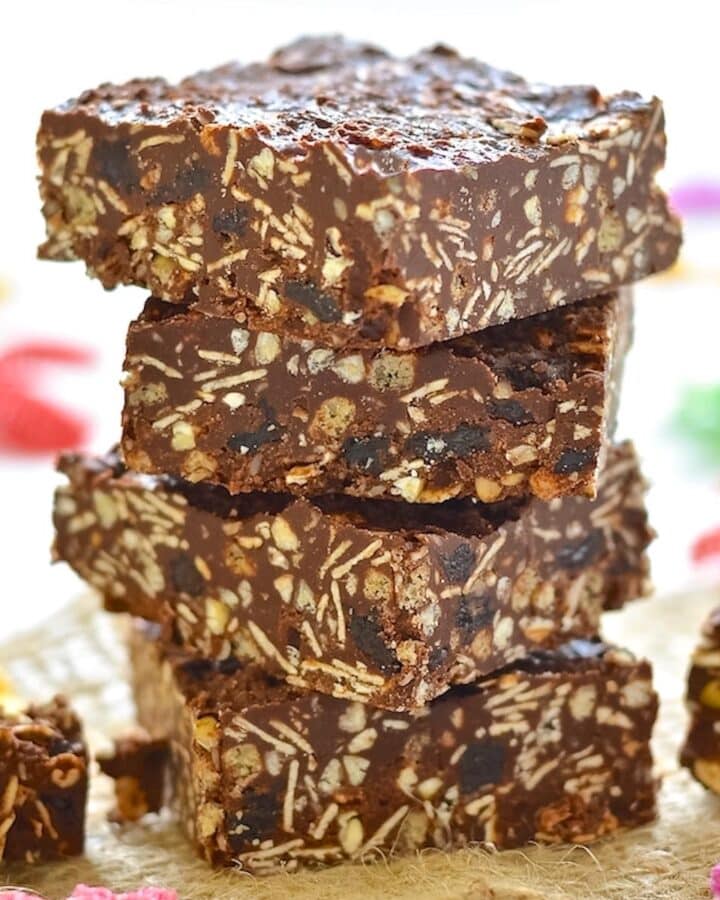 a stack of chocolate tahini crunch bars