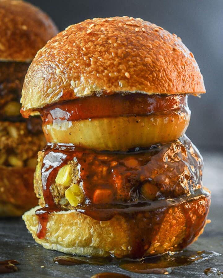 A Vegan BBQ burger in a bun with BBQ sauce