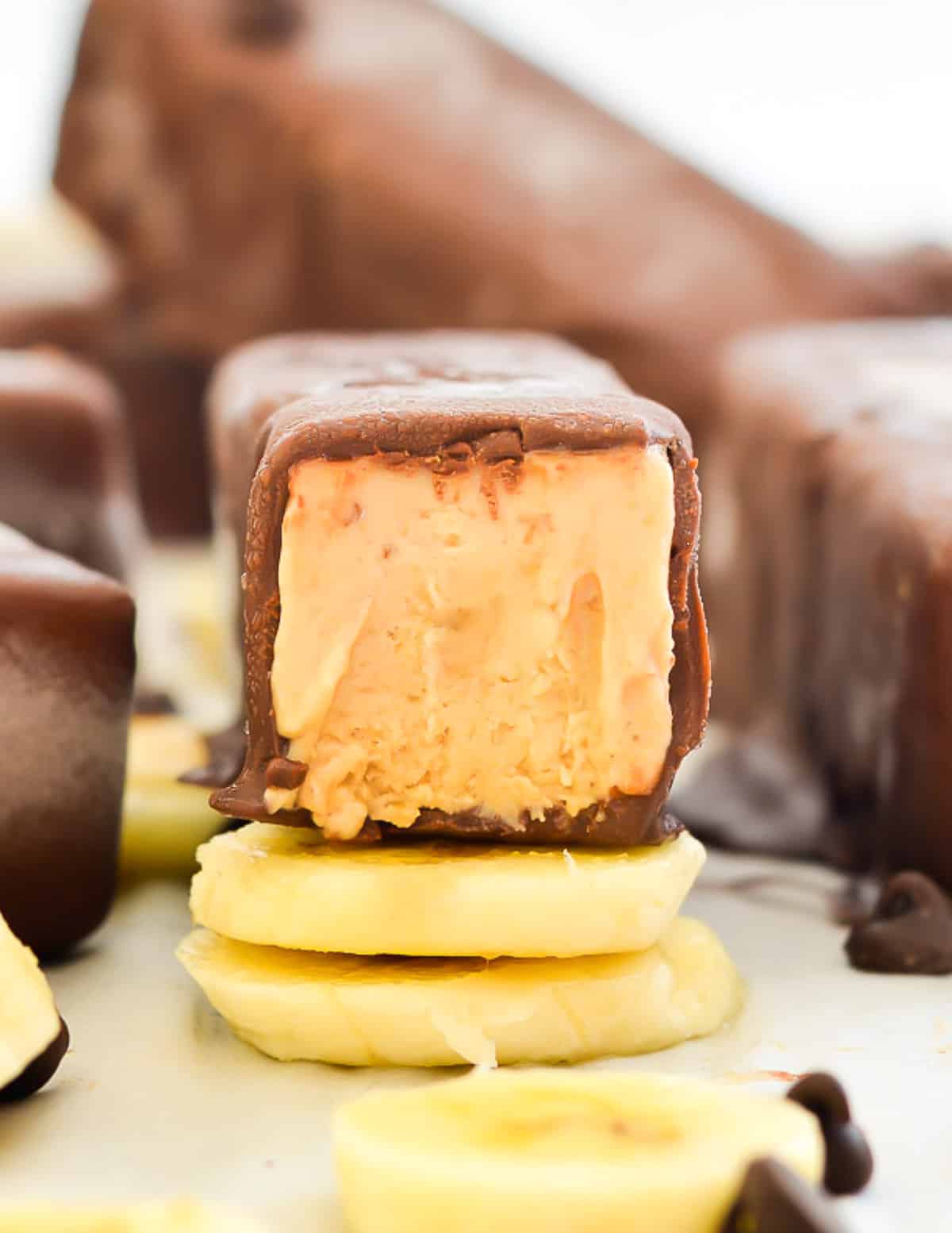 a banana peanut butter ice cream bar with inside showing