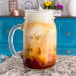 frothy, creamy, iced coffee in a glass