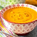 a bowl of carrot ginger soup