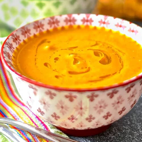 a bowl of carrot ginger soup