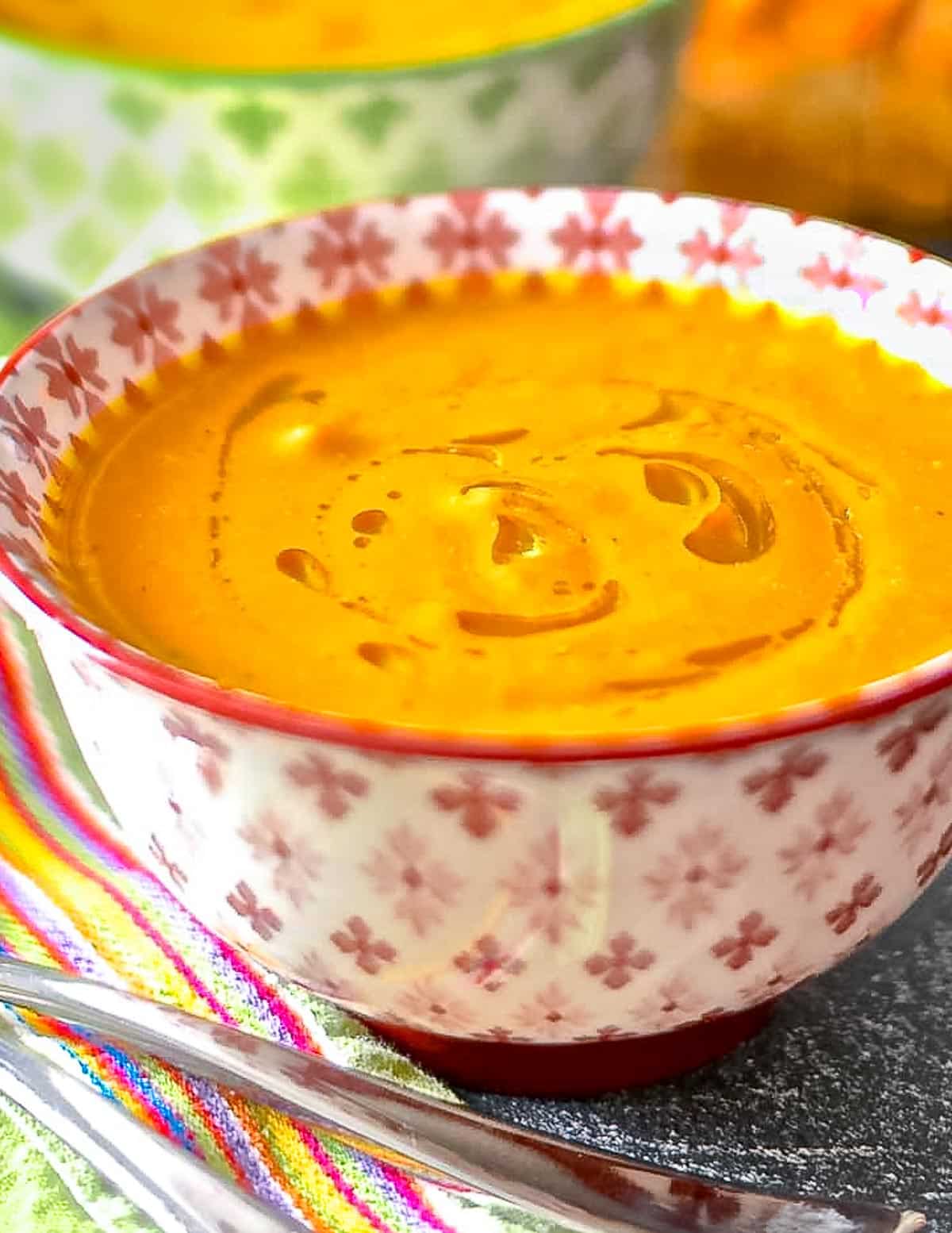 a bowl of vegan carrot ginger soup