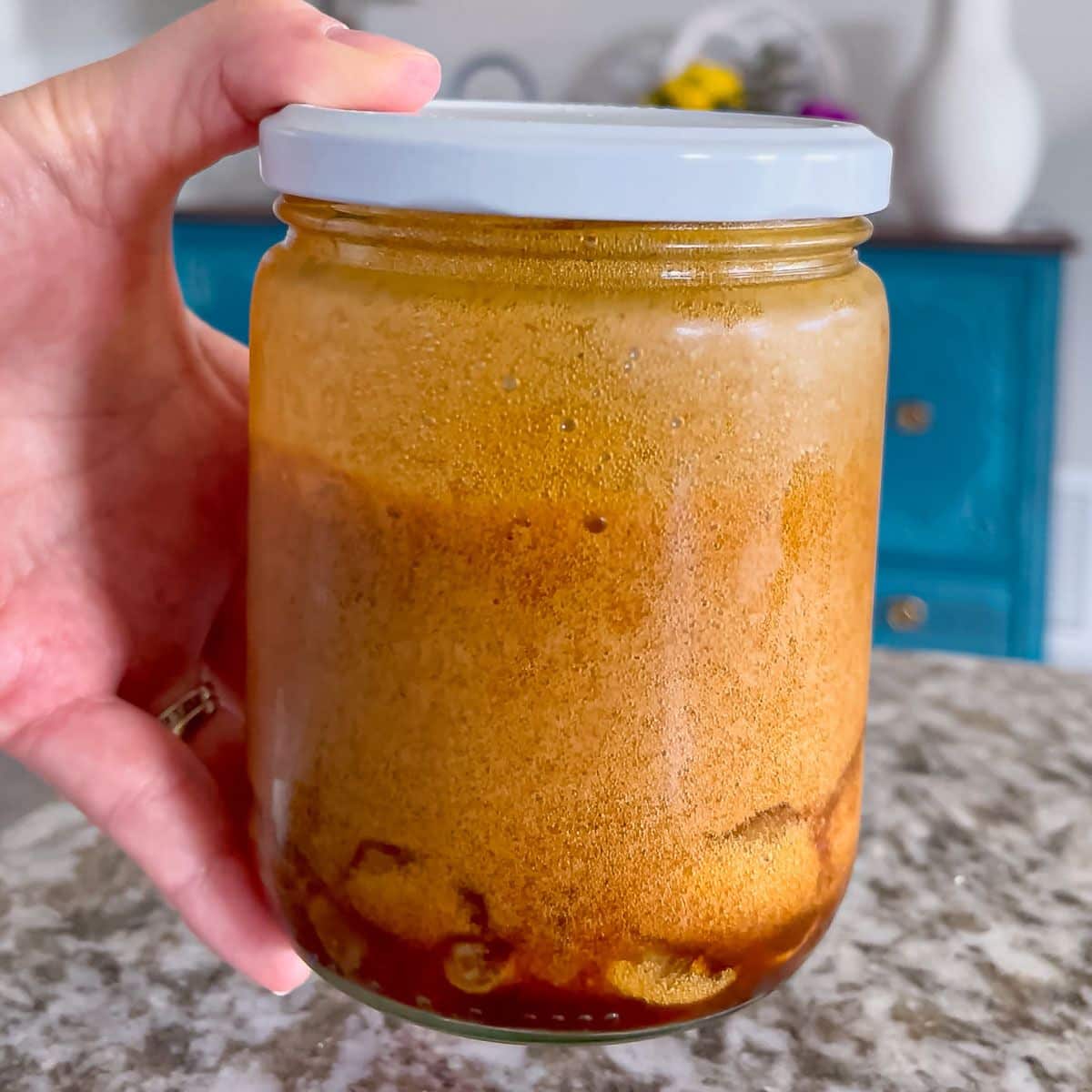 shaking the drink in a jar