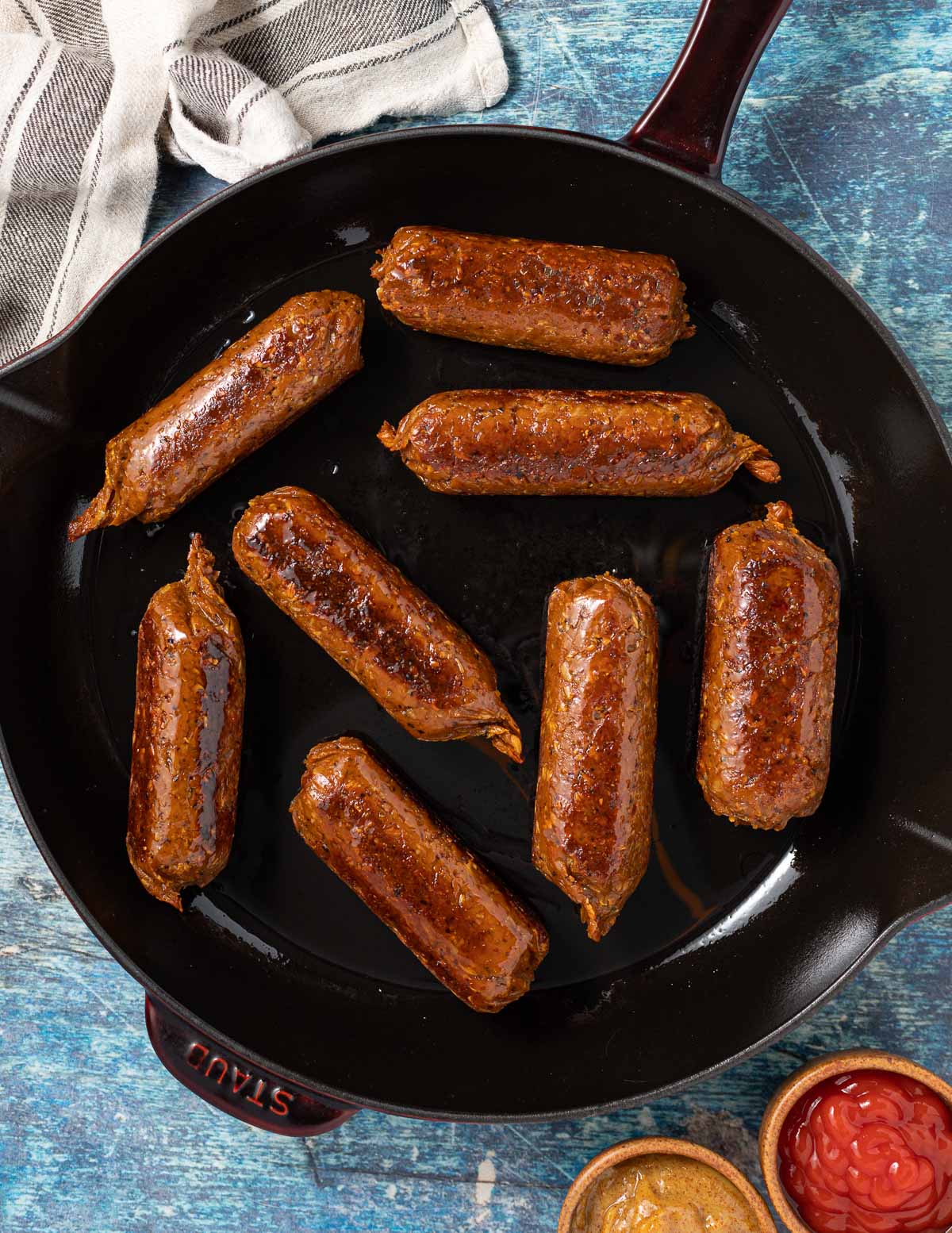 vegan sausages in a skillet