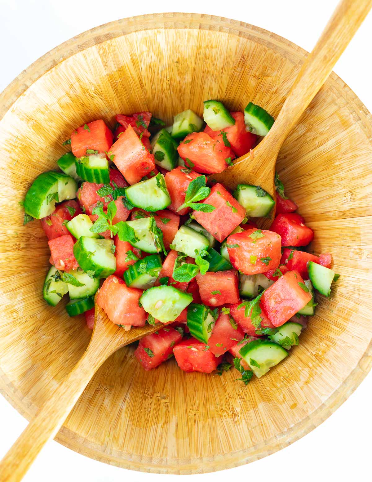 wooden salad bowl with watermelon salad
