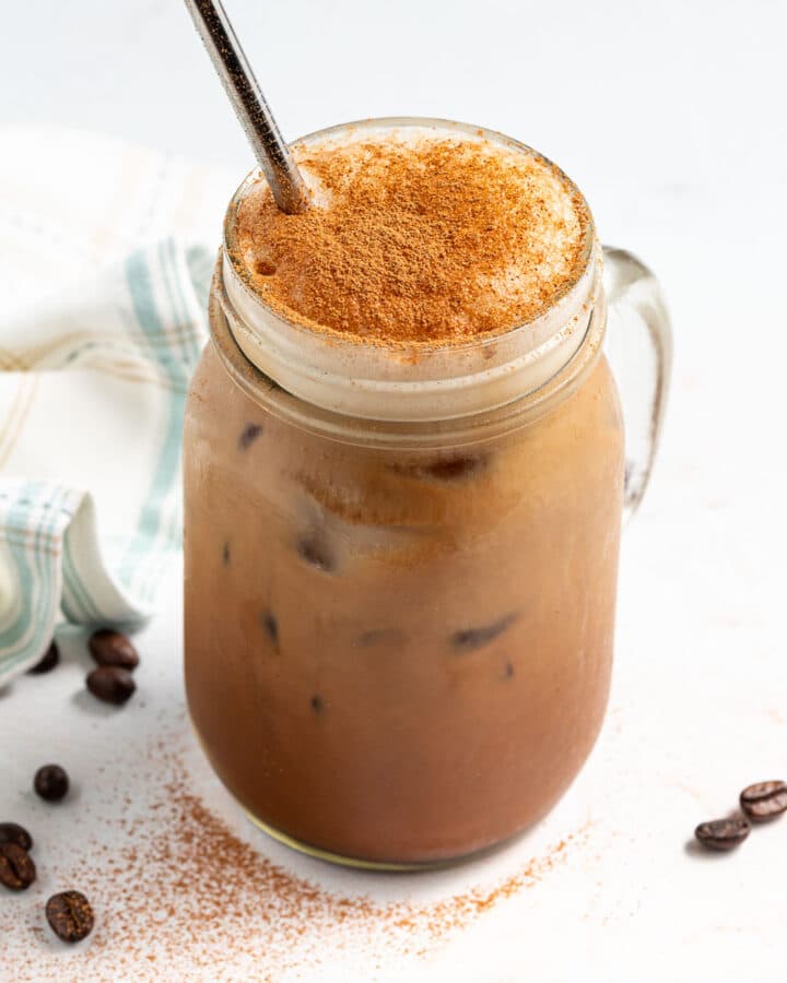 a glass of iced chocolate almond milk shaken espresso
