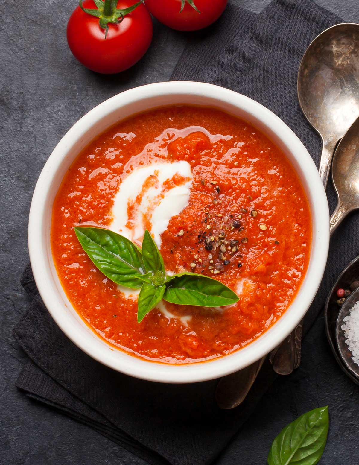 a bowl of tomato basil soup with cashew cream