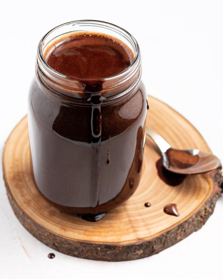 a jar of vegan chocolate syrup